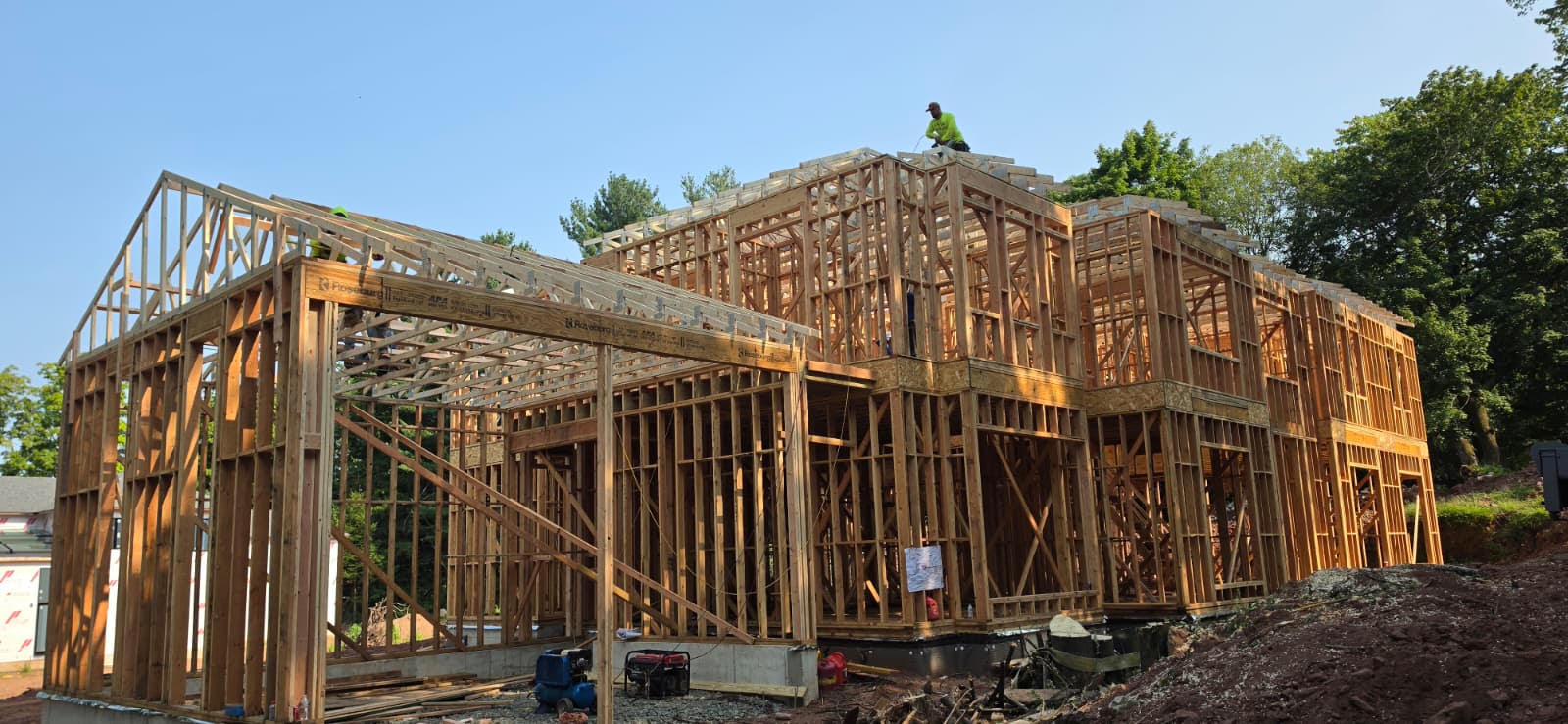 House framing project by JSE Construction — roof trusses and wall framing