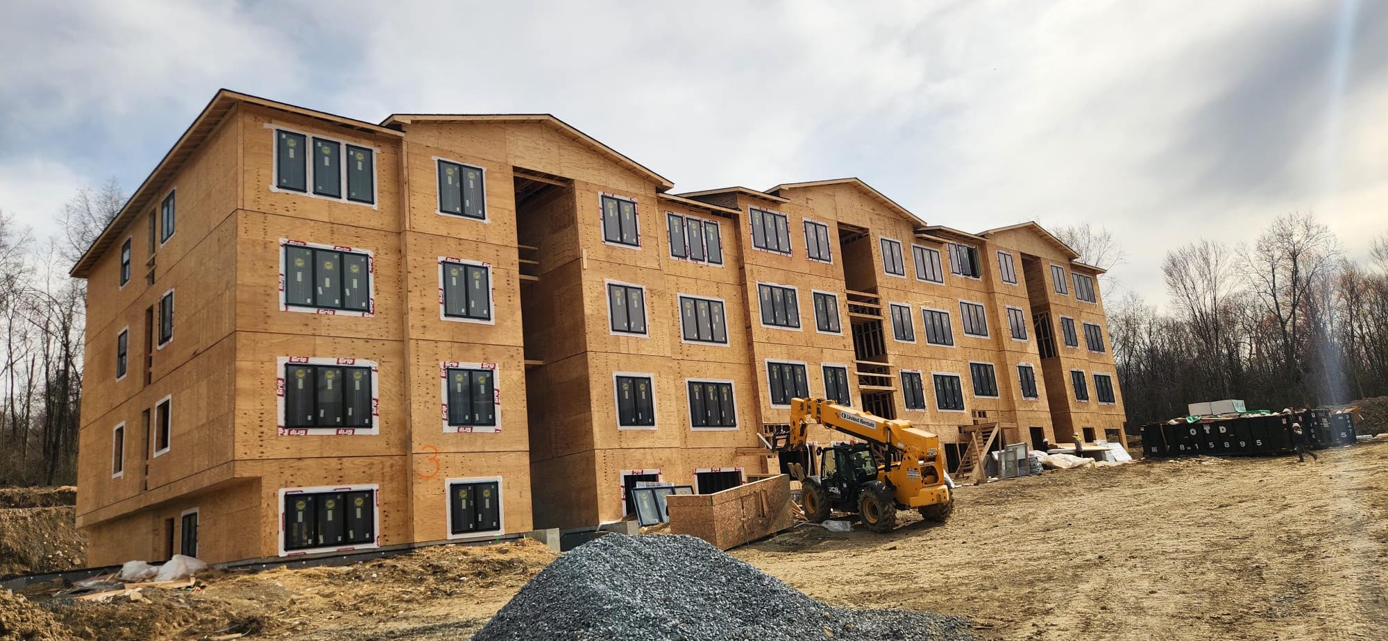 Multi-unit building framing project, sheathed exterior by JSE Construction